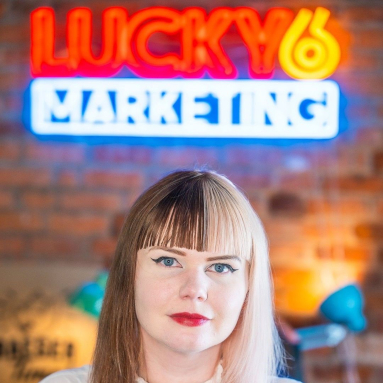 lucky6marketing colourful customneon logo brickwall 1